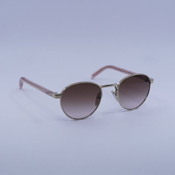 Prada PRB52S ZVN0A6 Sunglasses Pale Gold Round Frame, Brown Gradient Lenses main image 7
